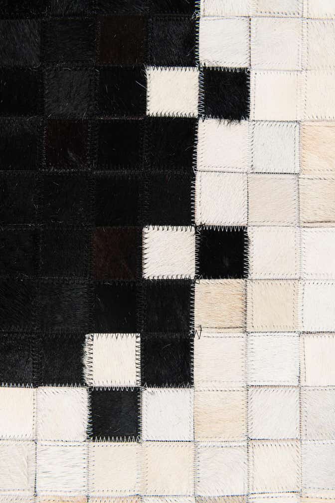 5' 1 x 7' 10 Cowhide Stocks Rug