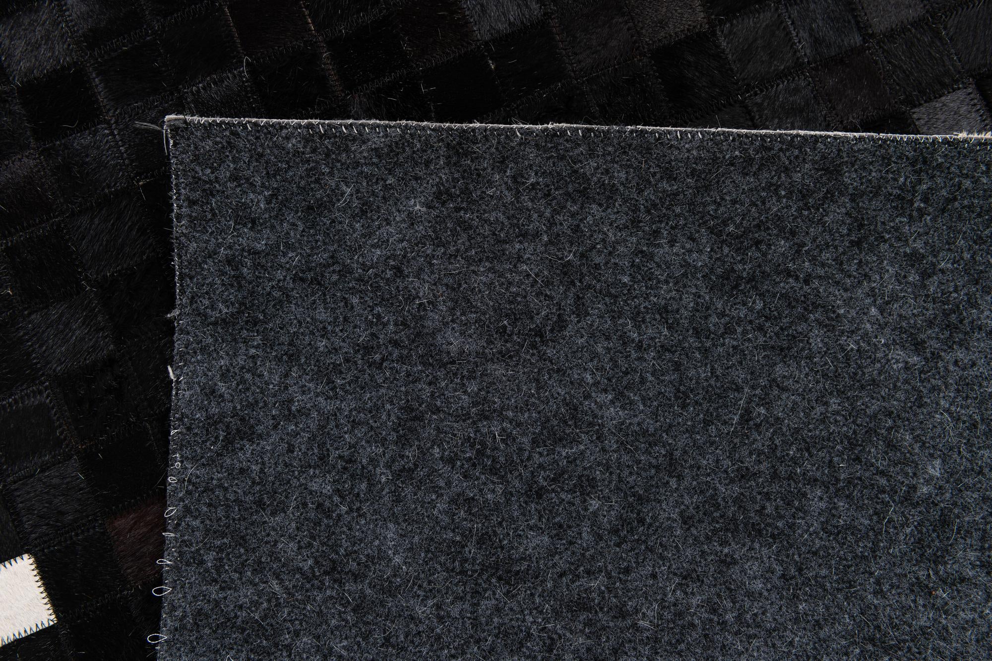 5' 1 x 7' 10 Cowhide Stocks Rug