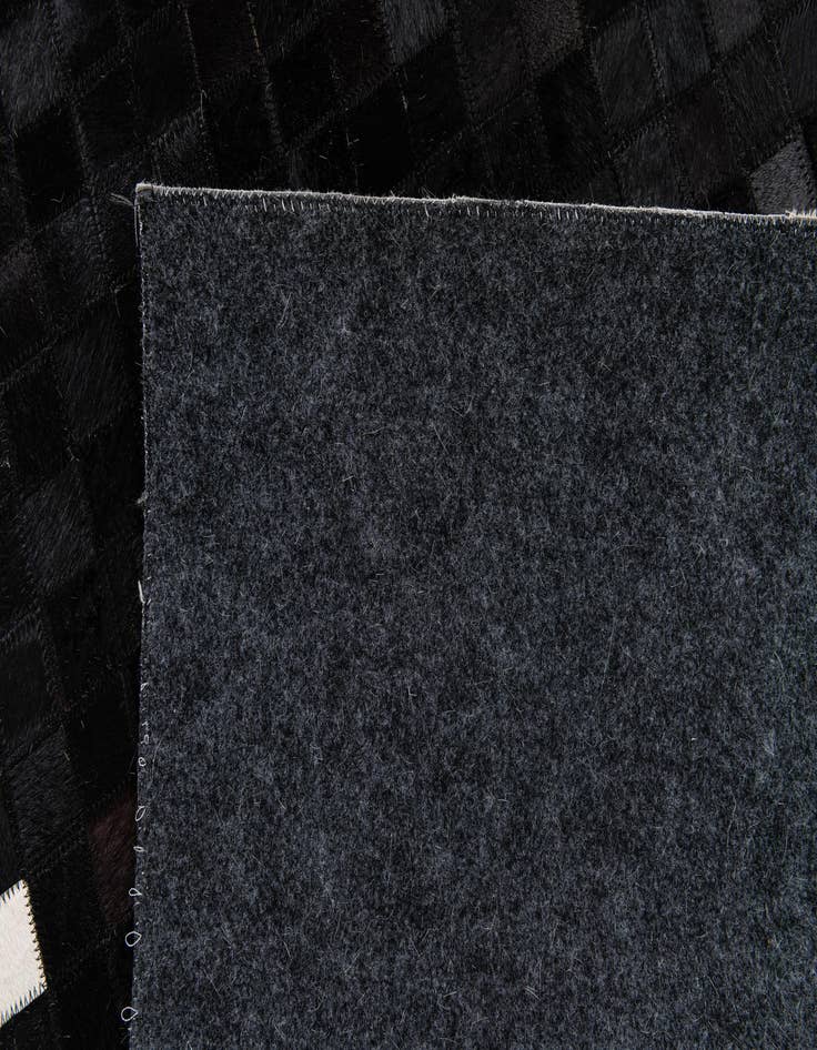 Detail image of 5' 1 x 7' 10 Cowhide Stocks Rug