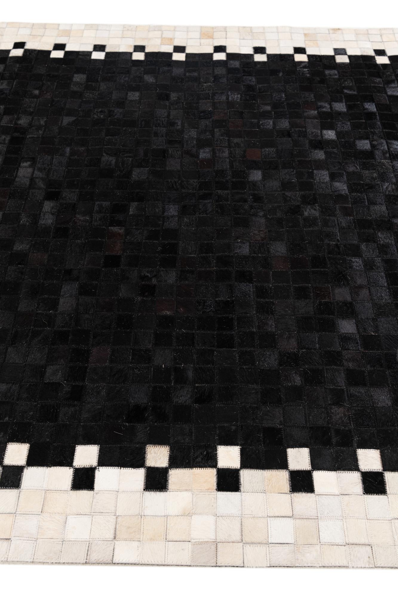 5' 1 x 7' 10 Cowhide Stocks Rug