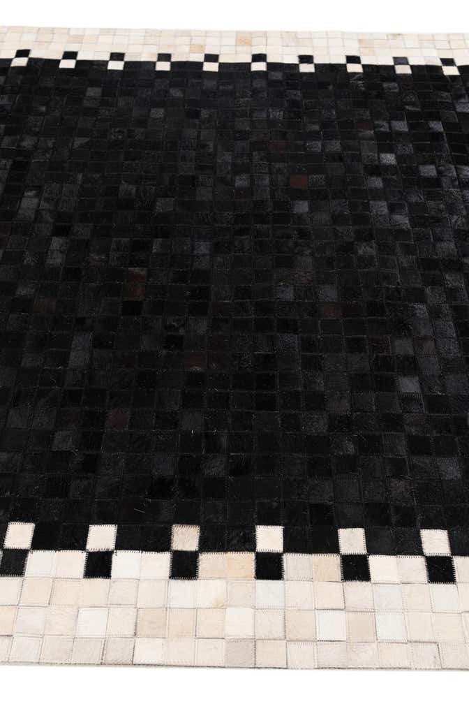 5' 1 x 7' 10 Cowhide Stocks Rug