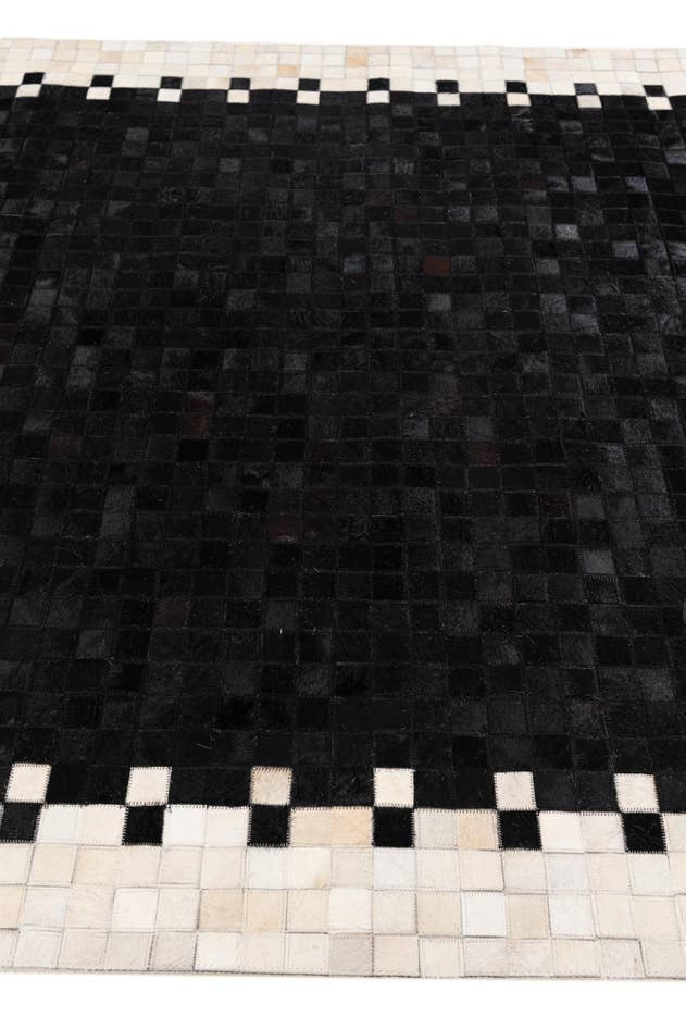 Detail image of 5' 1 x 7' 10 Cowhide Stocks Rug