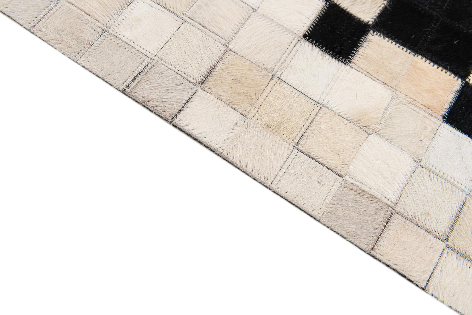 5' 1 x 7' 10 Cowhide Stocks Rug