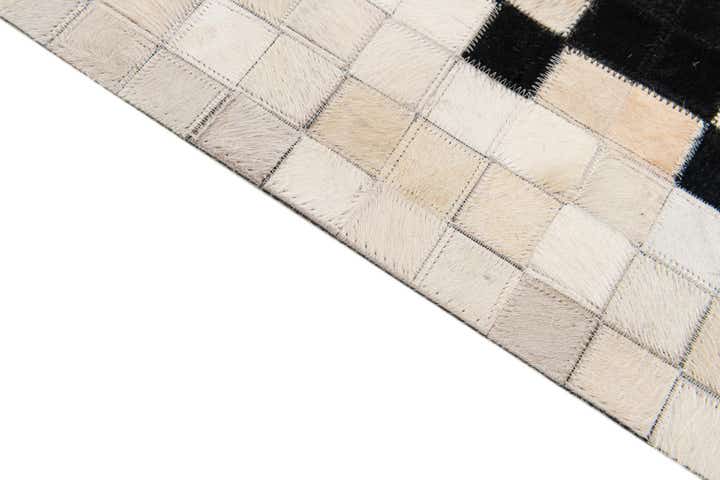 5' 1 x 7' 10 Cowhide Stocks Rug