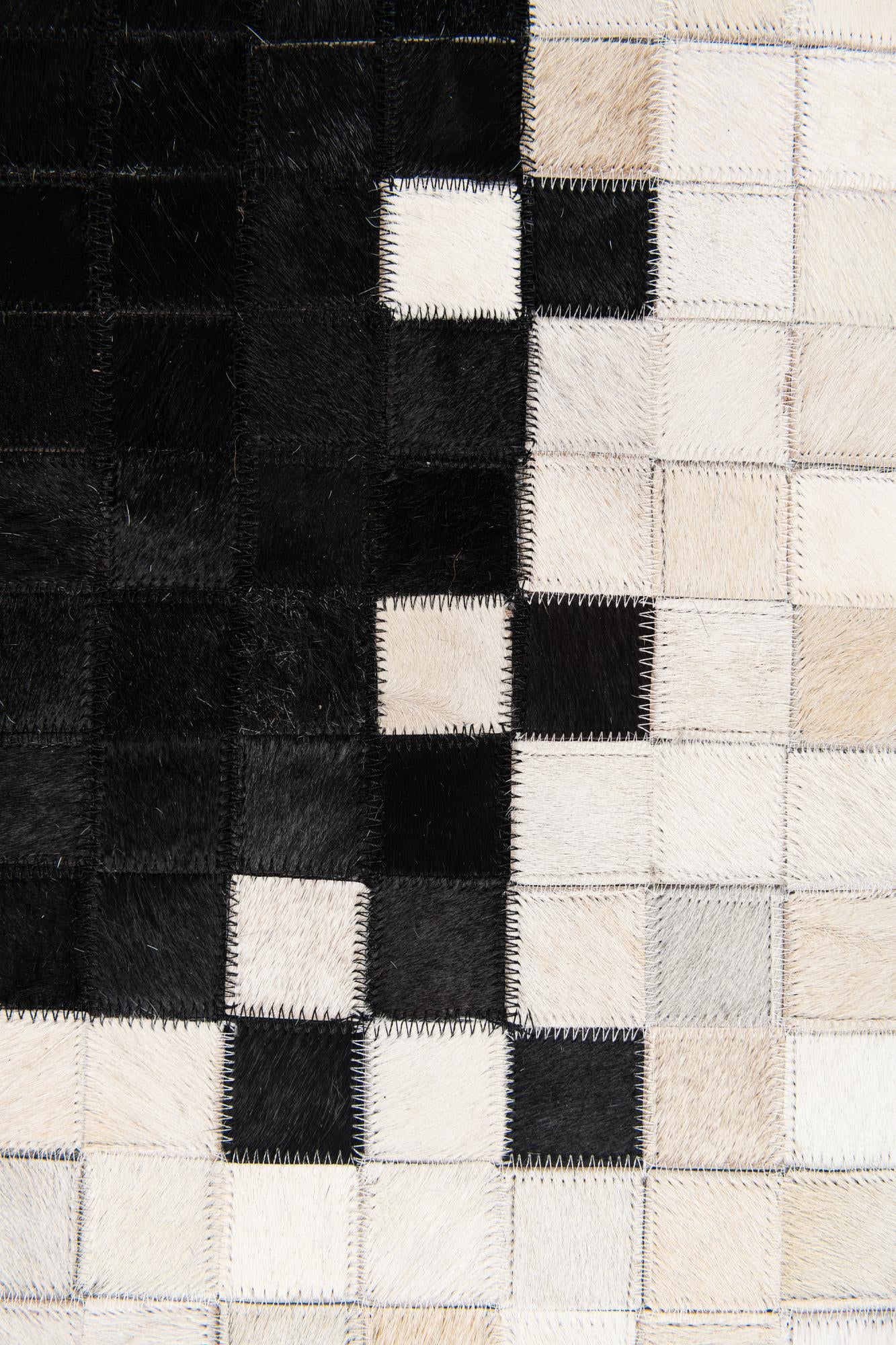 5' 1 x 7' 10 Cowhide Stocks Rug