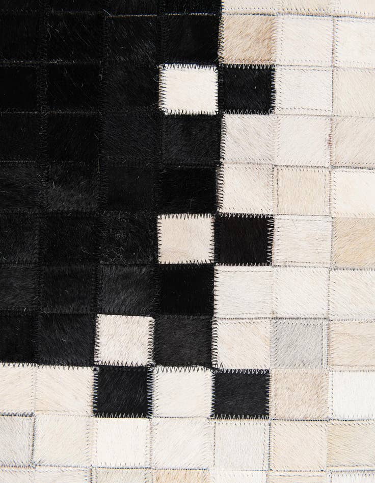 Detail image of 5' 1 x 7' 10 Cowhide Stocks Rug