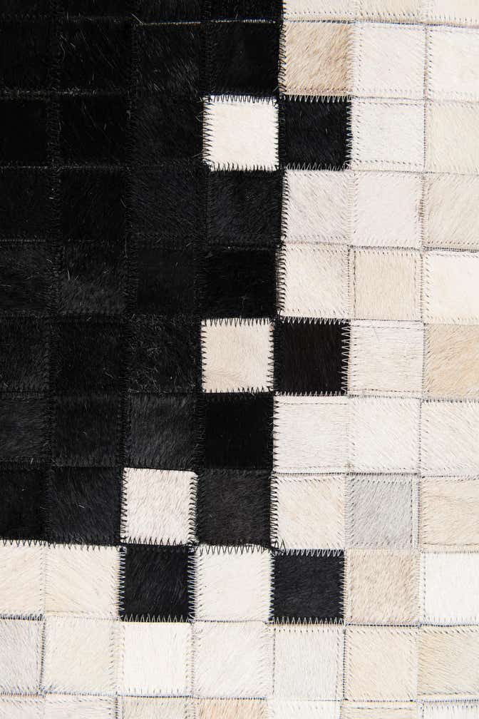 5' 1 x 7' 10 Cowhide Stocks Rug