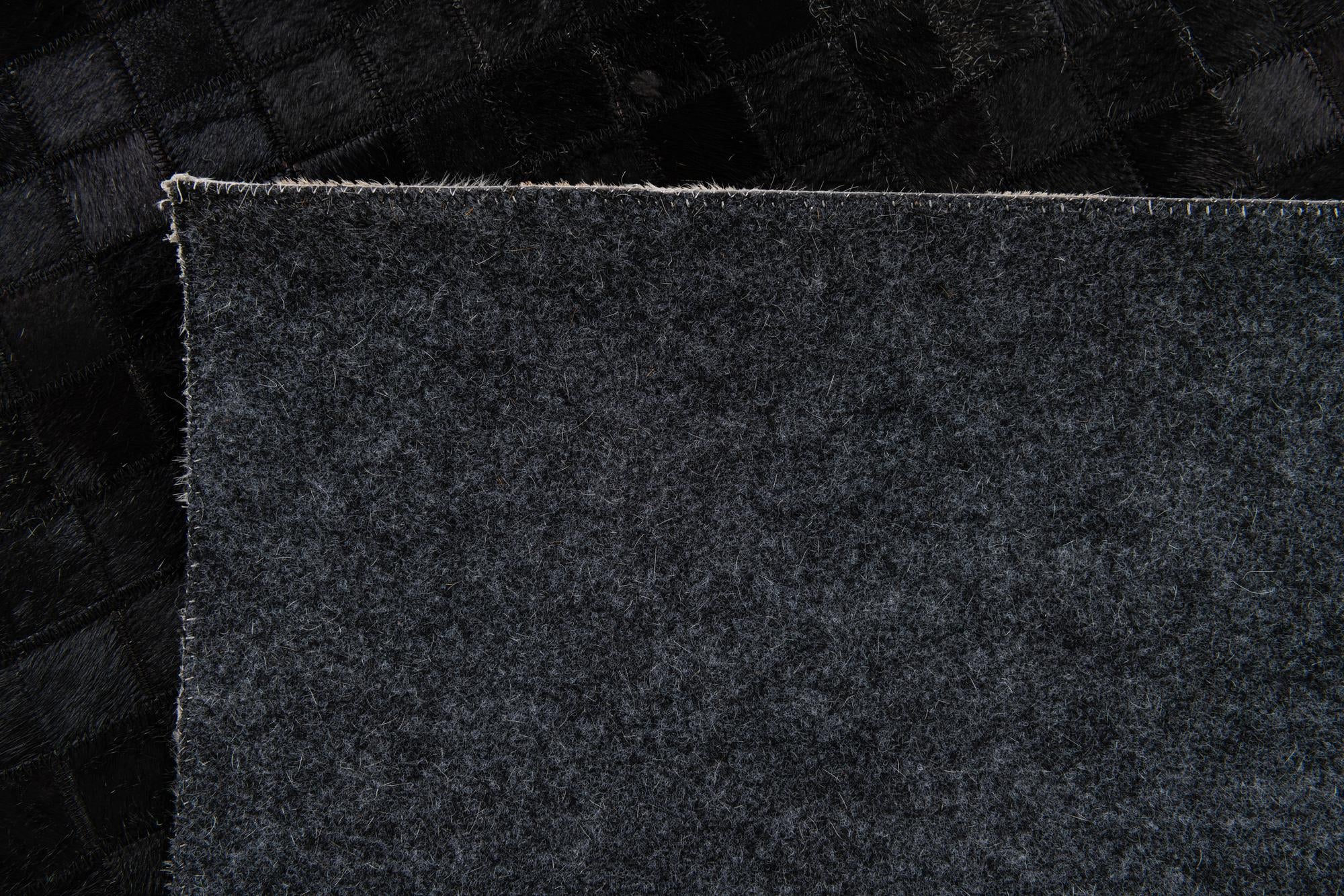 5' 1 x 7' 10 Cowhide Stocks Rug