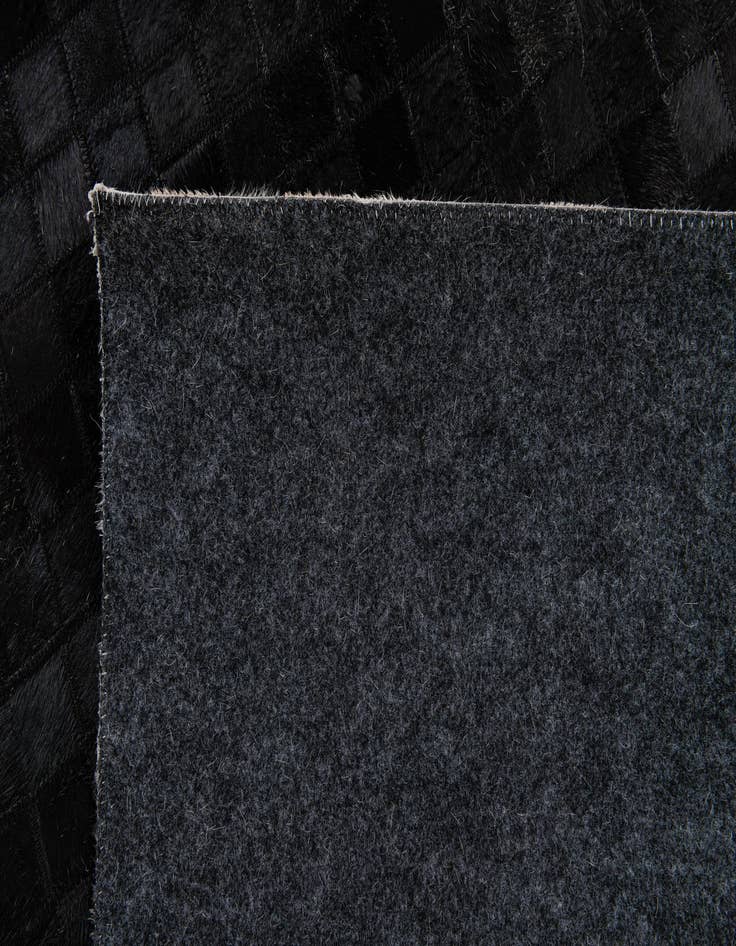 Detail image of 5' 1 x 7' 10 Cowhide Stocks Rug