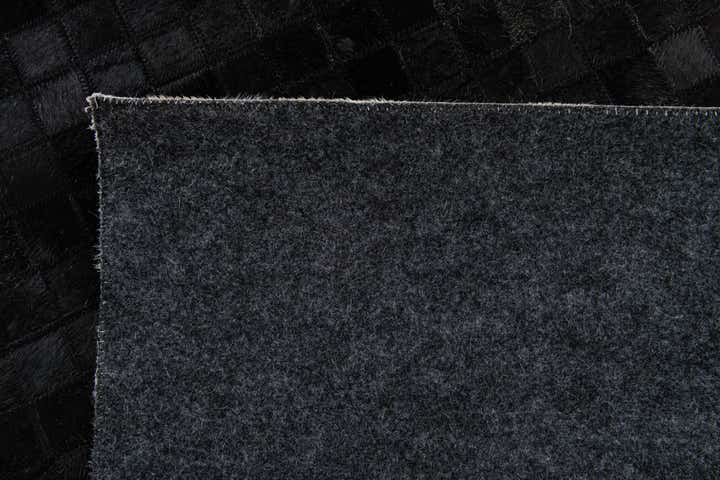 5' 1 x 7' 10 Cowhide Stocks Rug