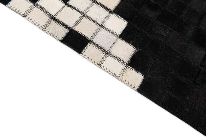 5' 2 x 7' 11 Cowhide Stocks Rug