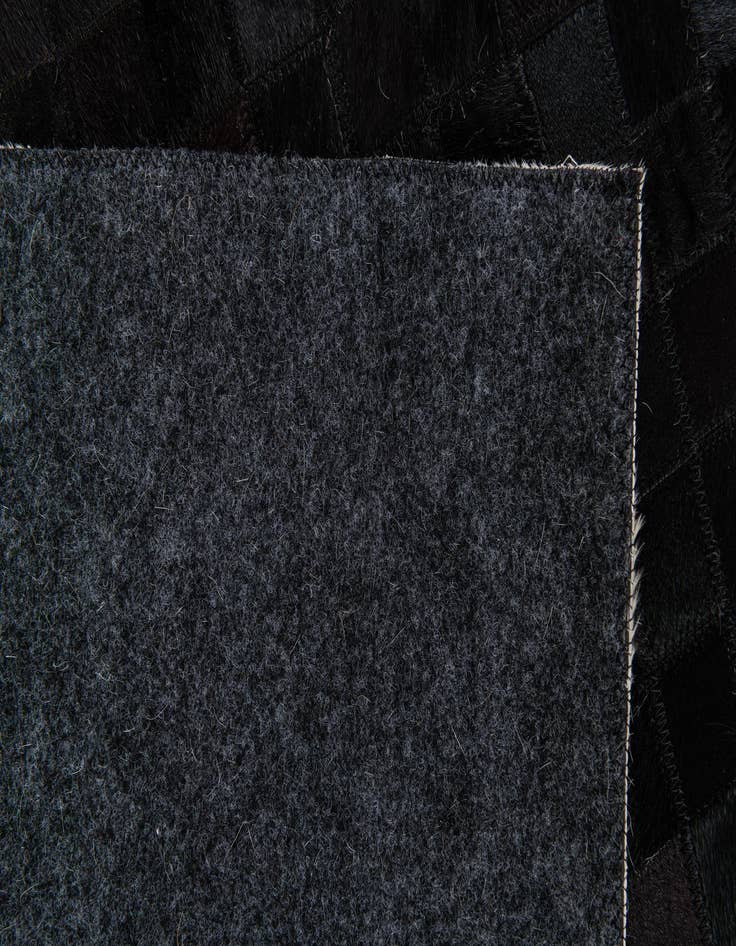 Detail image of 5' 2 x 7' 11 Cowhide Stocks Rug