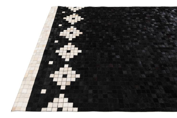 Detail image of 5' 1 x 7' 11 Cowhide Stocks Rug