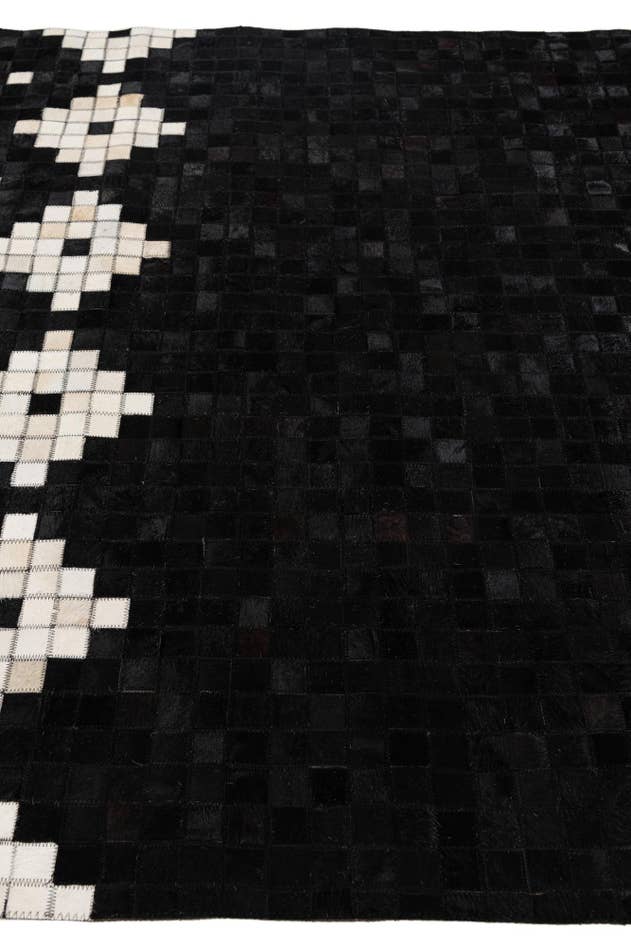 Detail image of 5' 1 x 7' 11 Cowhide Stocks Rug