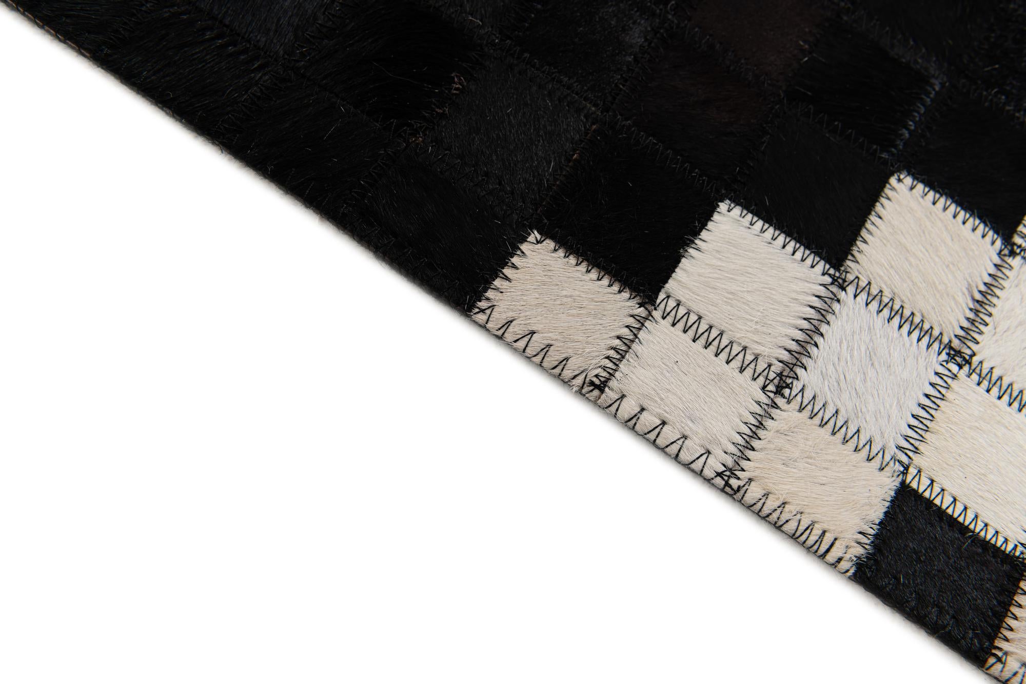 5' 1 x 7' 11 Cowhide Stocks Rug