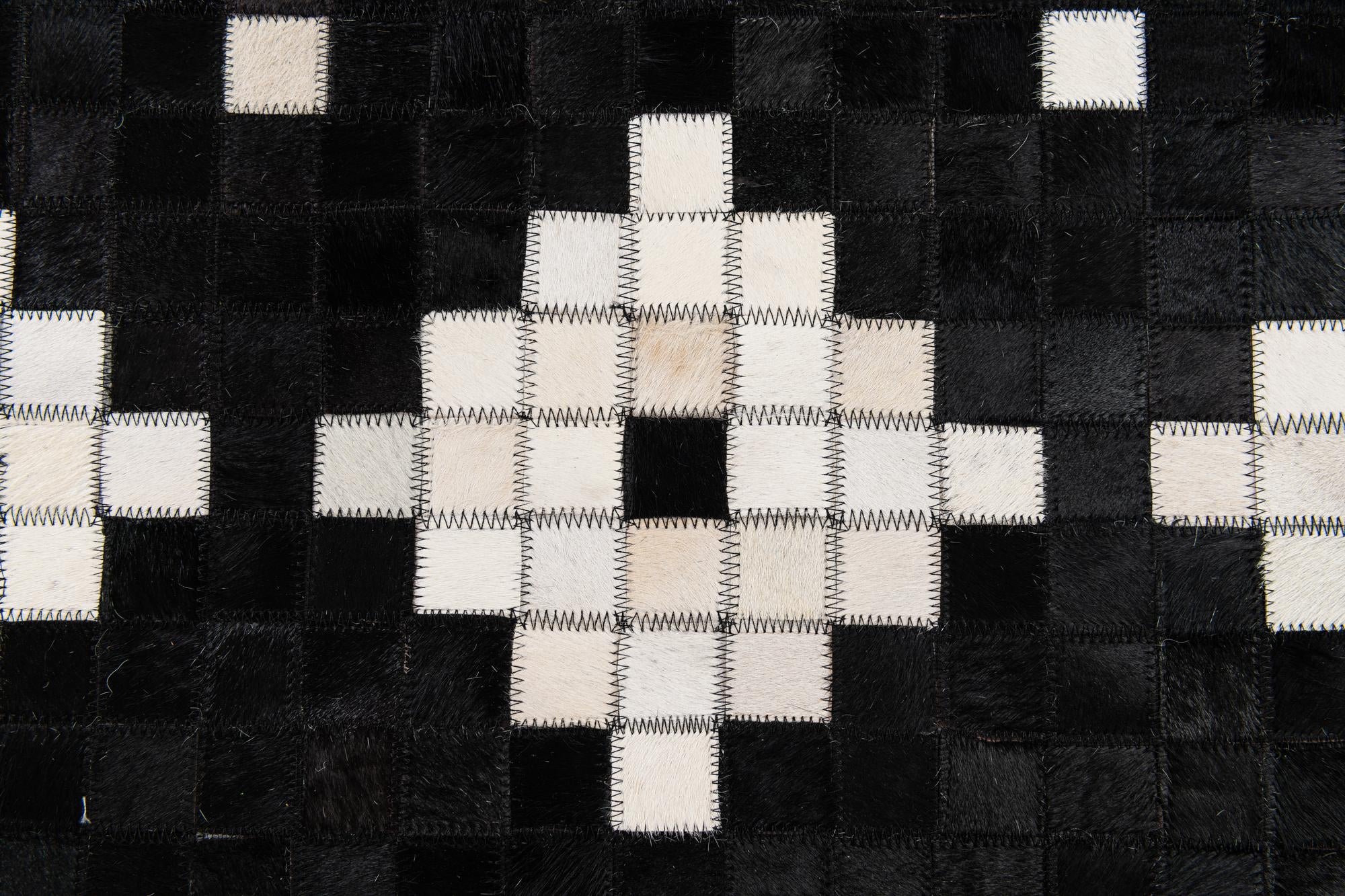 5' 1 x 7' 11 Cowhide Stocks Rug