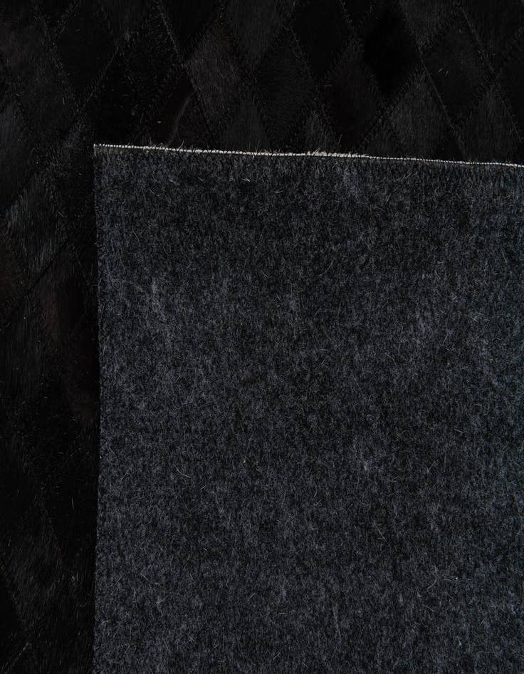 Detail image of 5' 1 x 7' 11 Cowhide Stocks Rug