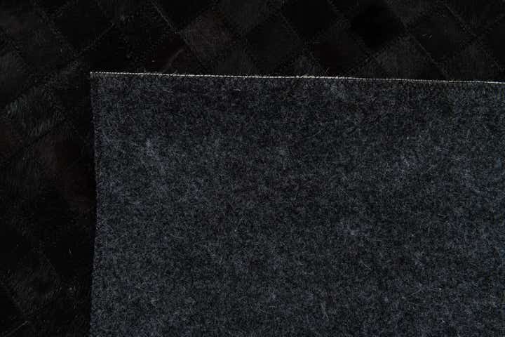 5' 1 x 7' 11 Cowhide Stocks Rug