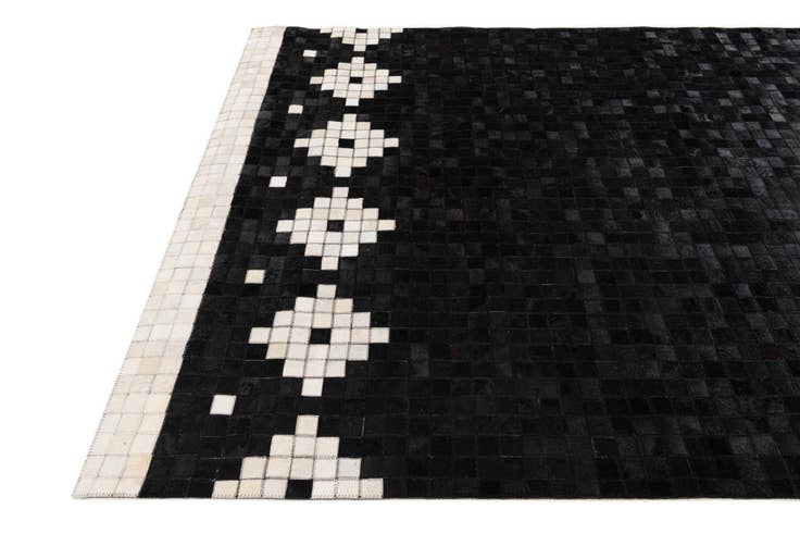 Detail image of 5' 2 x 8' Cowhide Stocks Rug