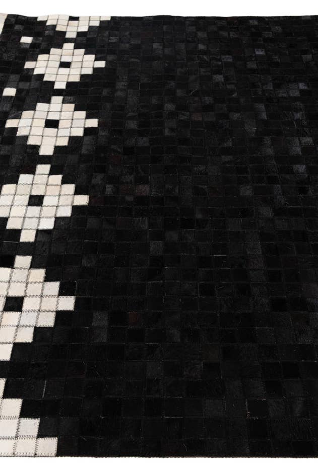 Detail image of 5' 2 x 8' Cowhide Stocks Rug