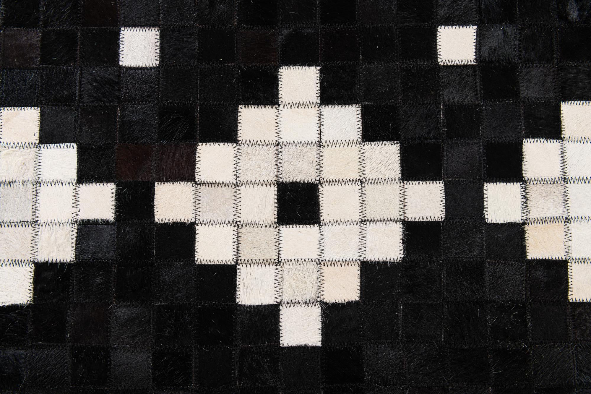 5' 2 x 8' Cowhide Stocks Rug