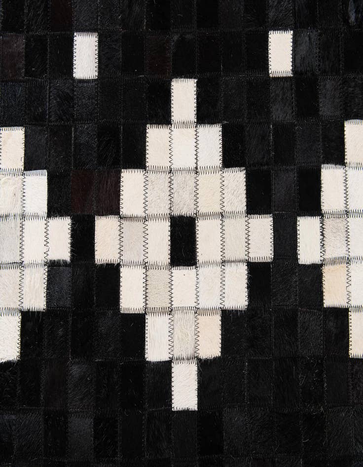 Detail image of 5' 2 x 8' Cowhide Stocks Rug