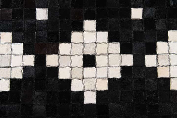 5' 2 x 8' Cowhide Stocks Rug