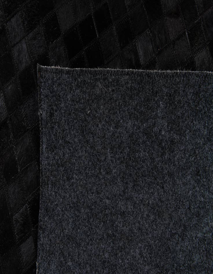 Detail image of 5' 2 x 8' Cowhide Stocks Rug