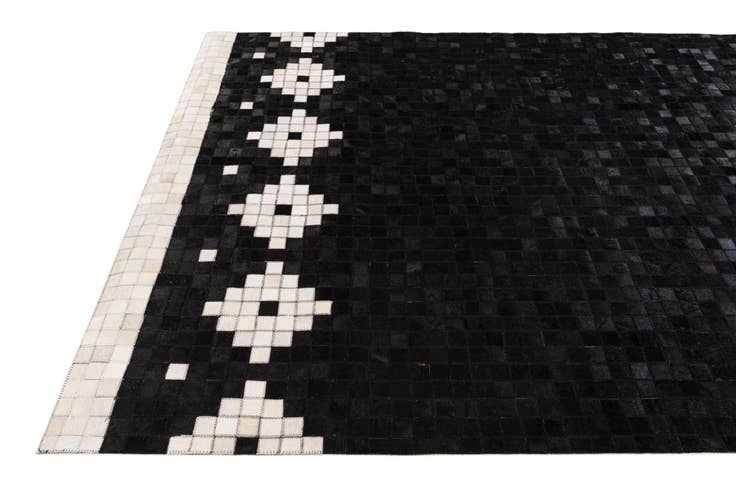 Detail image of 5' 2 x 8' Cowhide Stocks Rug