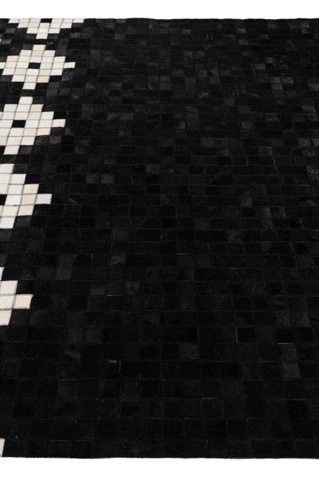 Detail image of 5' 2 x 8' Cowhide Stocks Rug