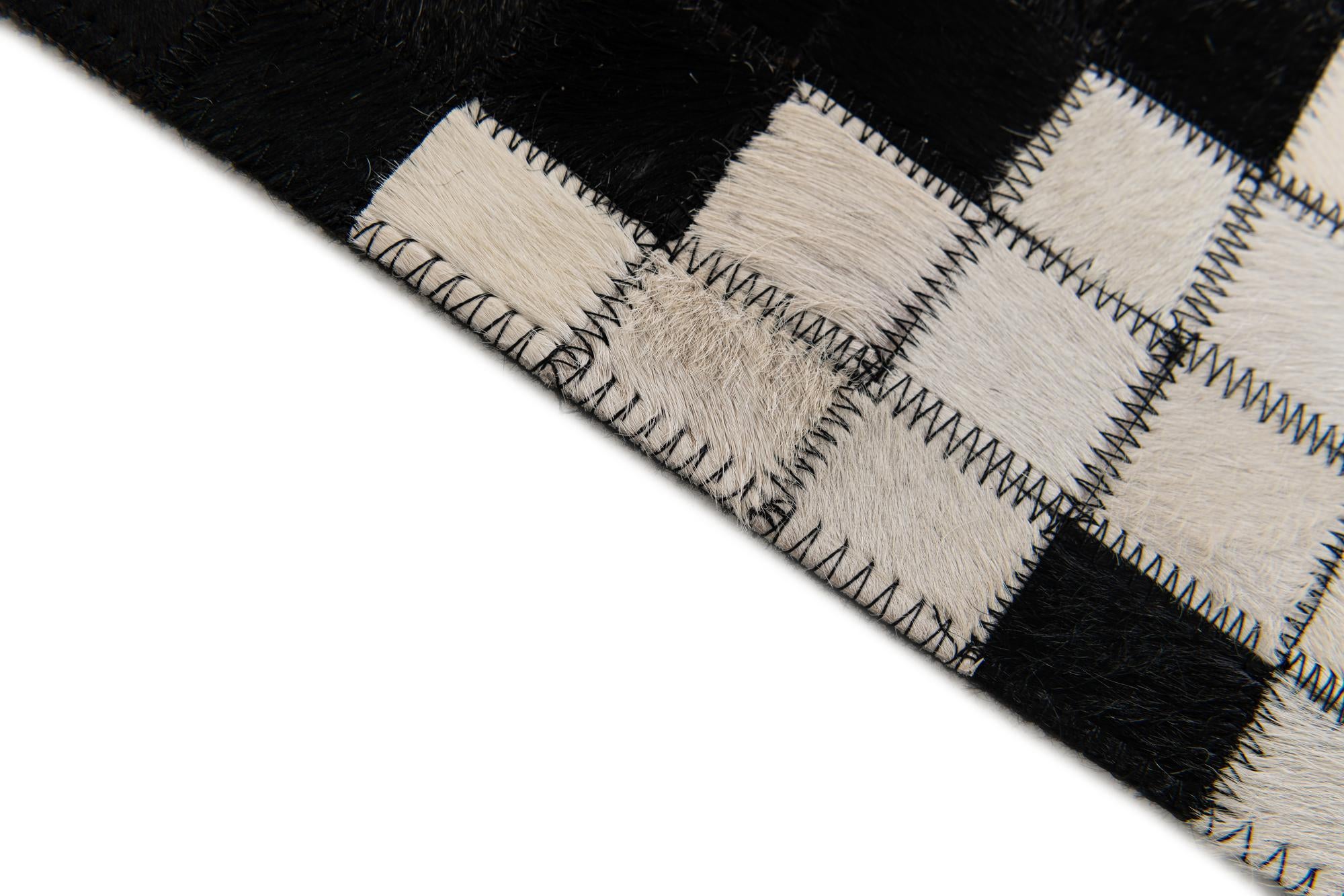 5' 2 x 8' Cowhide Stocks Rug