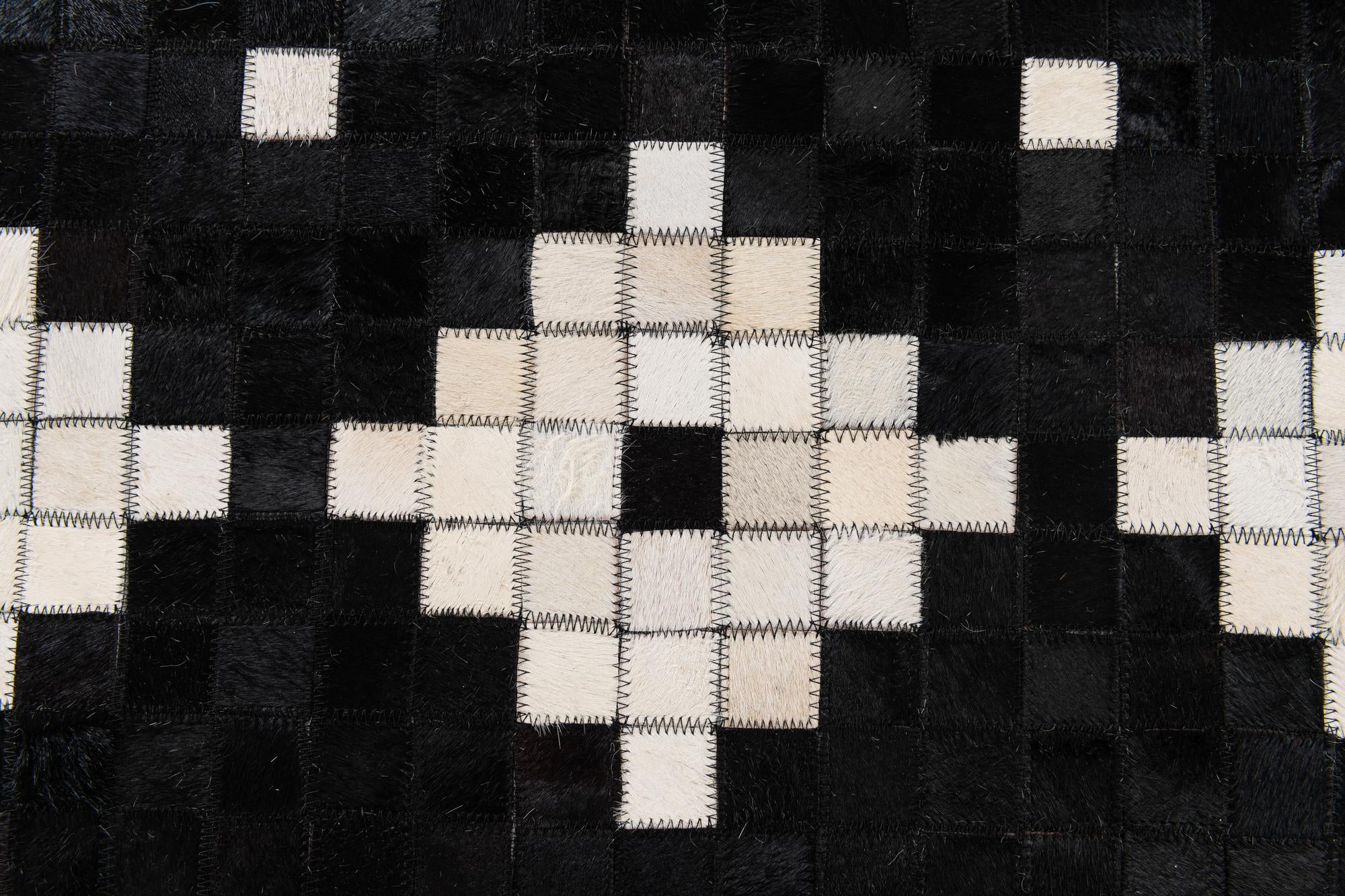 5' 2 x 8' Cowhide Stocks Rug