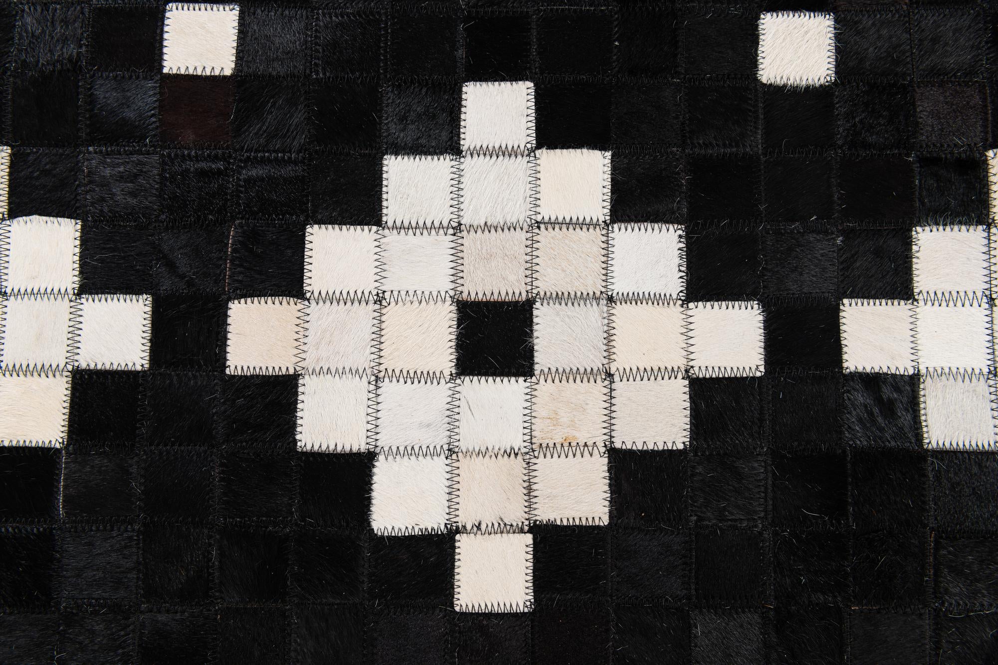 5' 2 x 8' Cowhide Stocks Rug