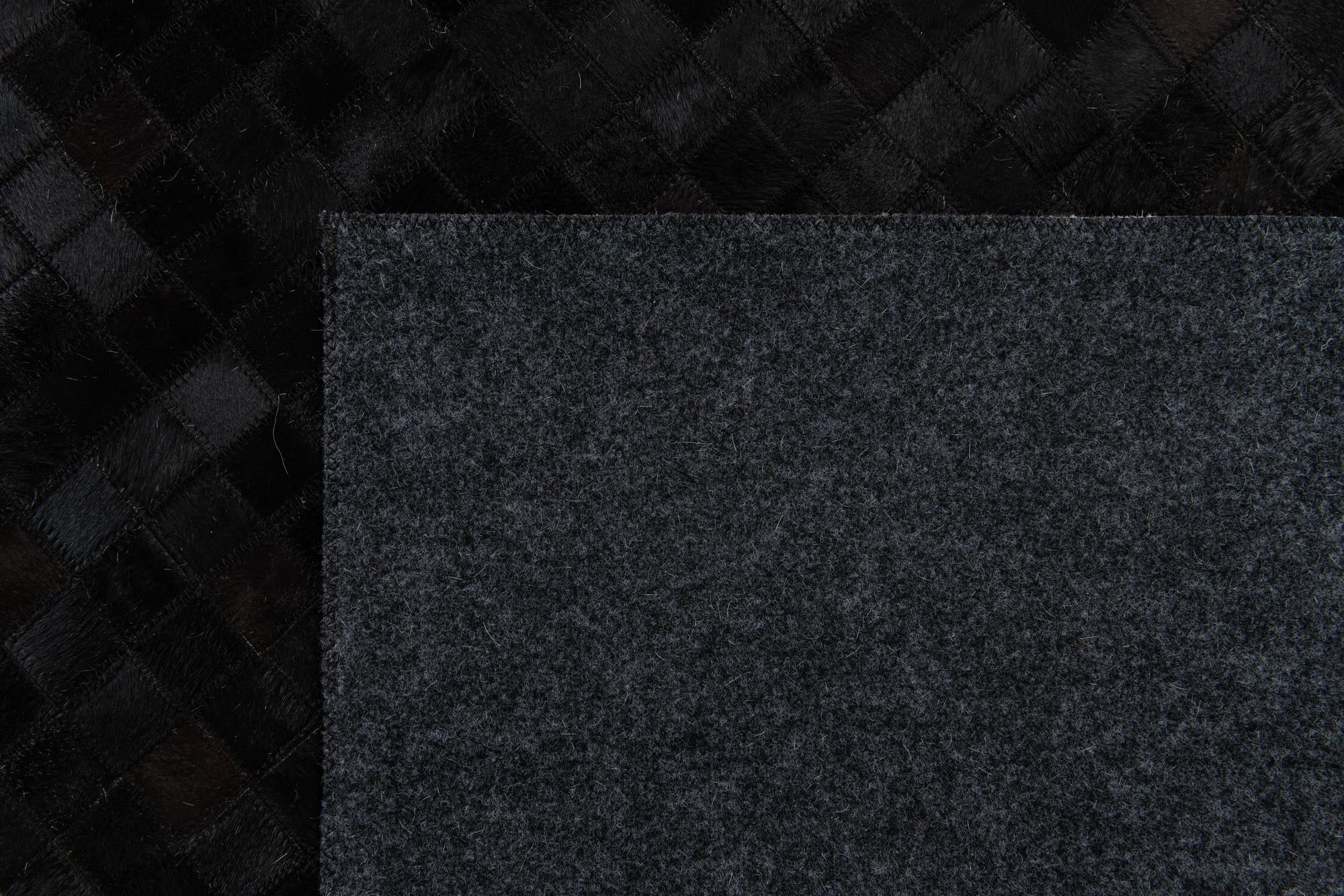 5' 2 x 8' Cowhide Stocks Rug