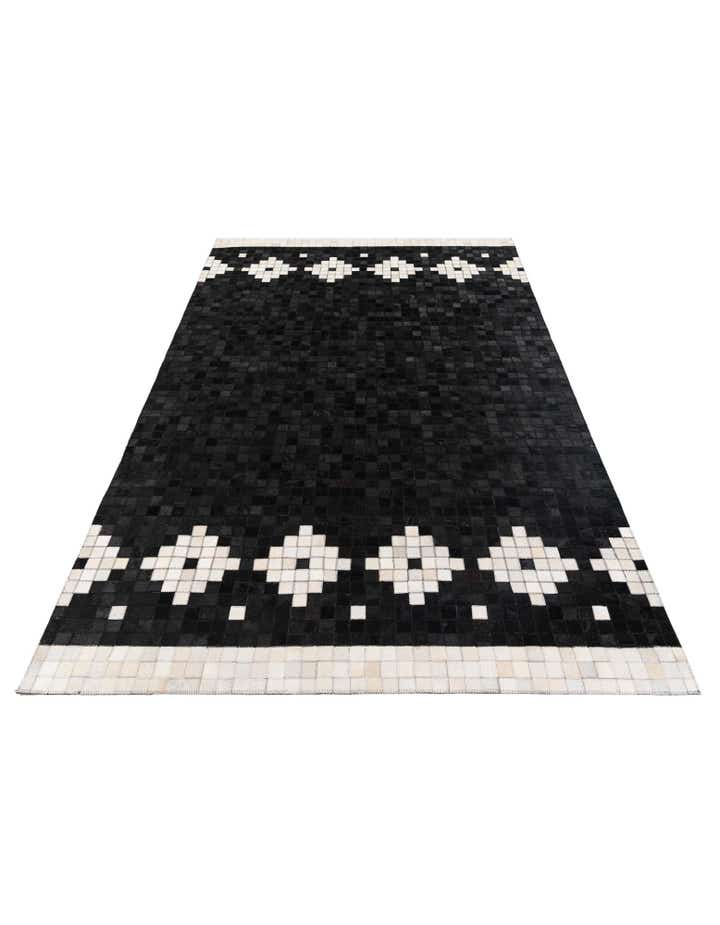 5' 1 x 7' 11 Cowhide Stocks Rug
