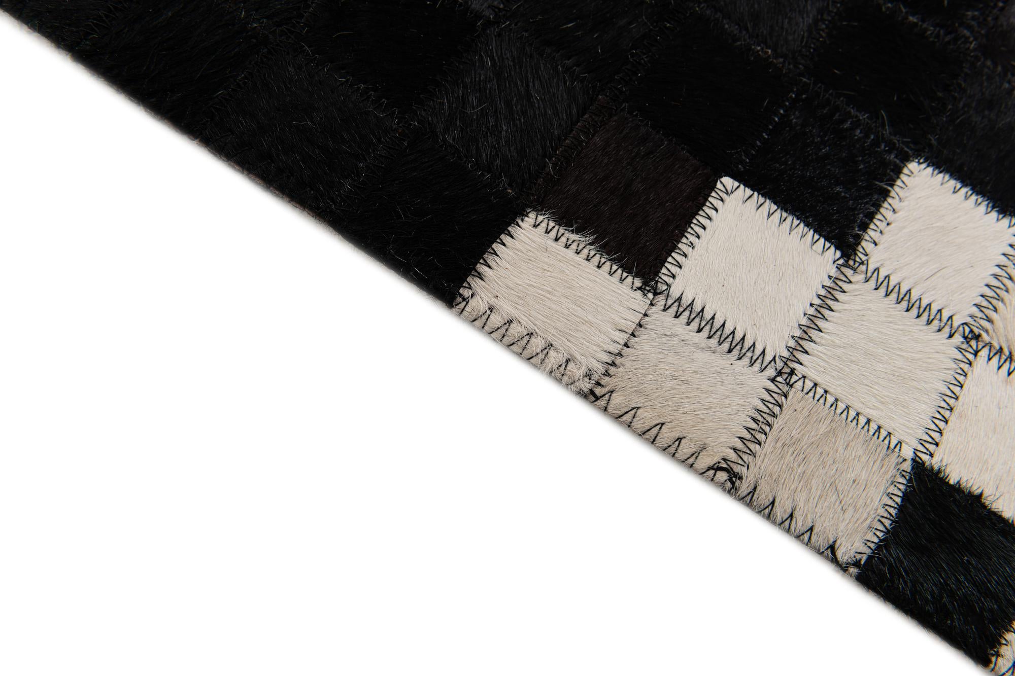 5' 1 x 7' 11 Cowhide Stocks Rug