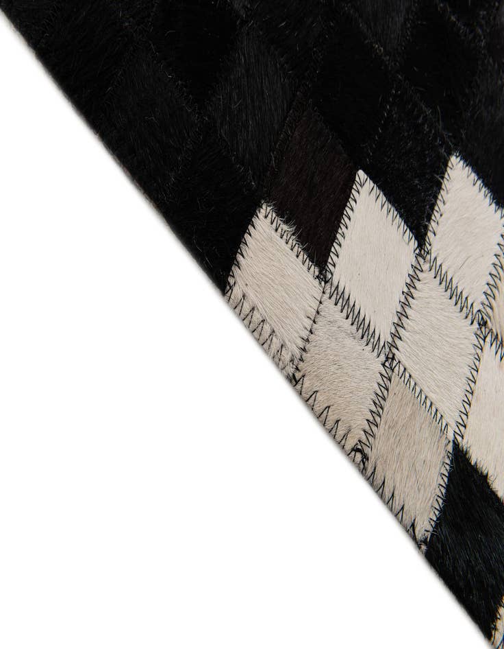 Detail image of 5' 1 x 7' 11 Cowhide Stocks Rug
