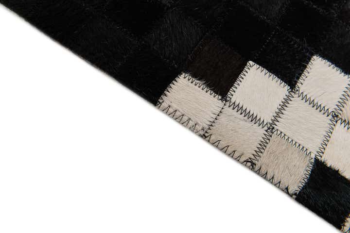 5' 1 x 7' 11 Cowhide Stocks Rug