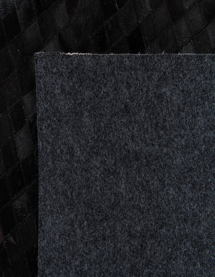 Detail image of 5' 1 x 7' 11 Cowhide Stocks Rug