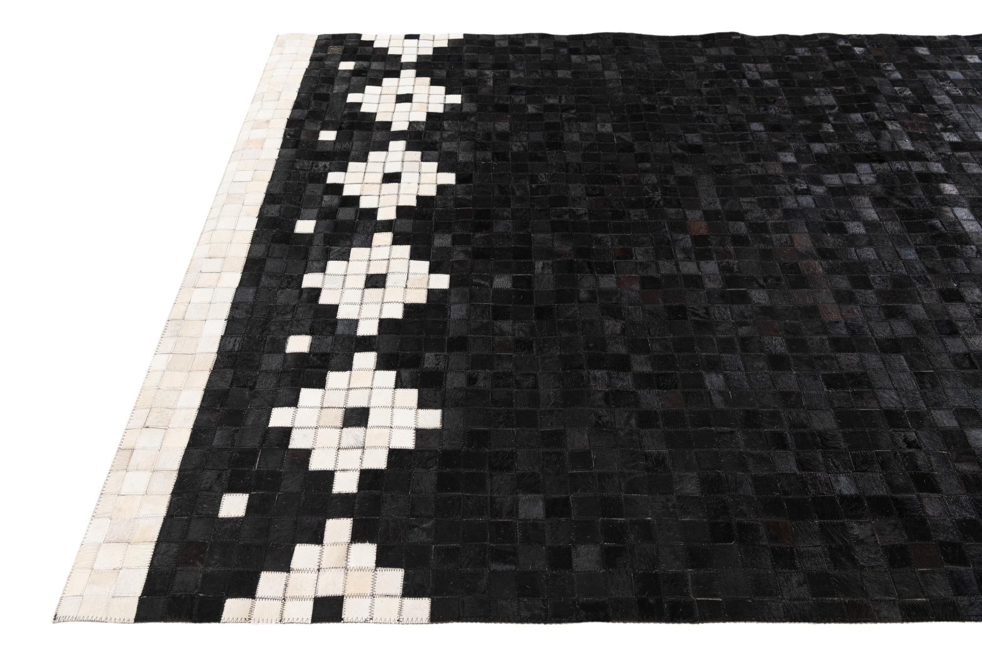5' 2 x 8' 1 Cowhide Stocks Rug