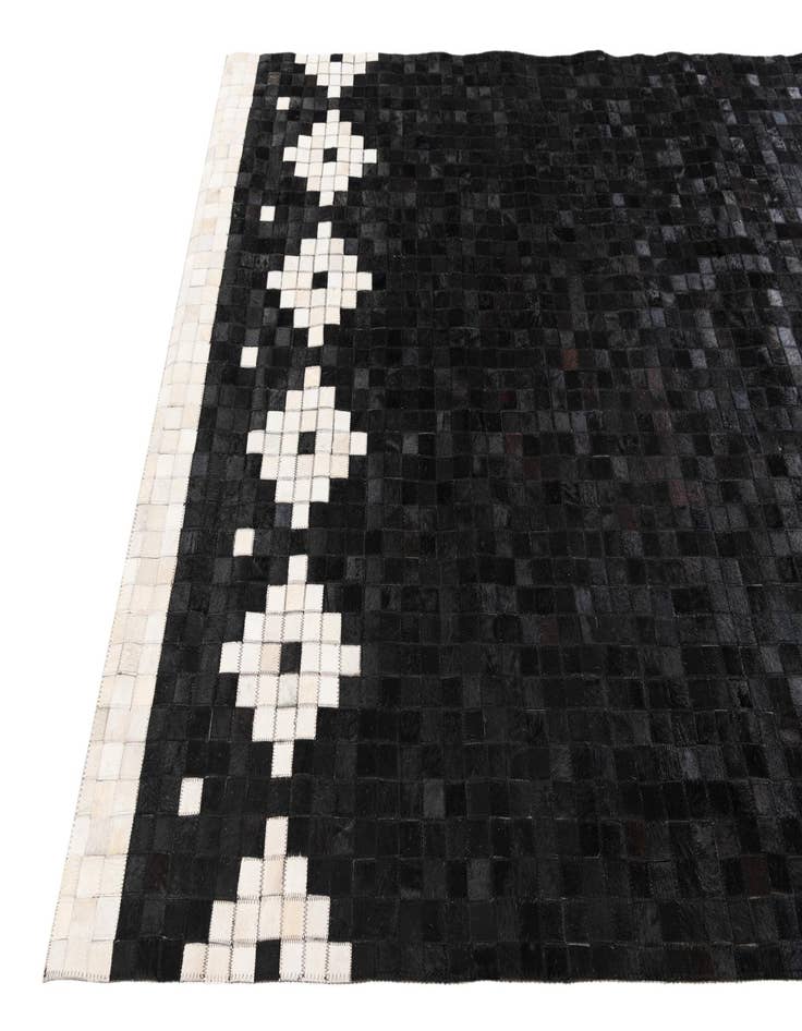 Detail image of 5' 2 x 8' 1 Cowhide Stocks Rug