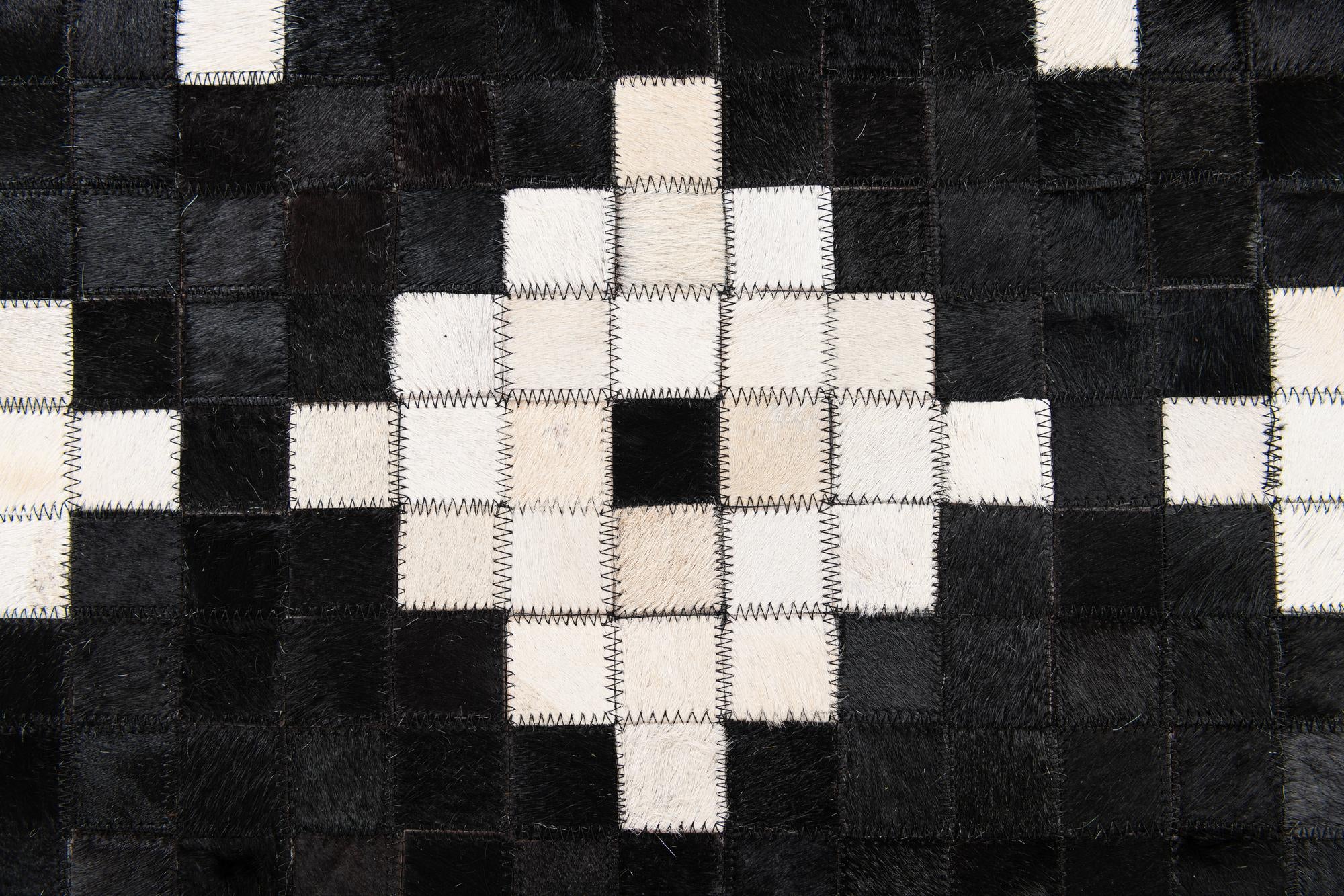 5' 2 x 8' 1 Cowhide Stocks Rug
