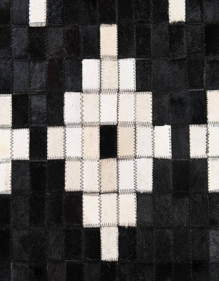 Detail image of 5' 2 x 8' 1 Cowhide Stocks Rug