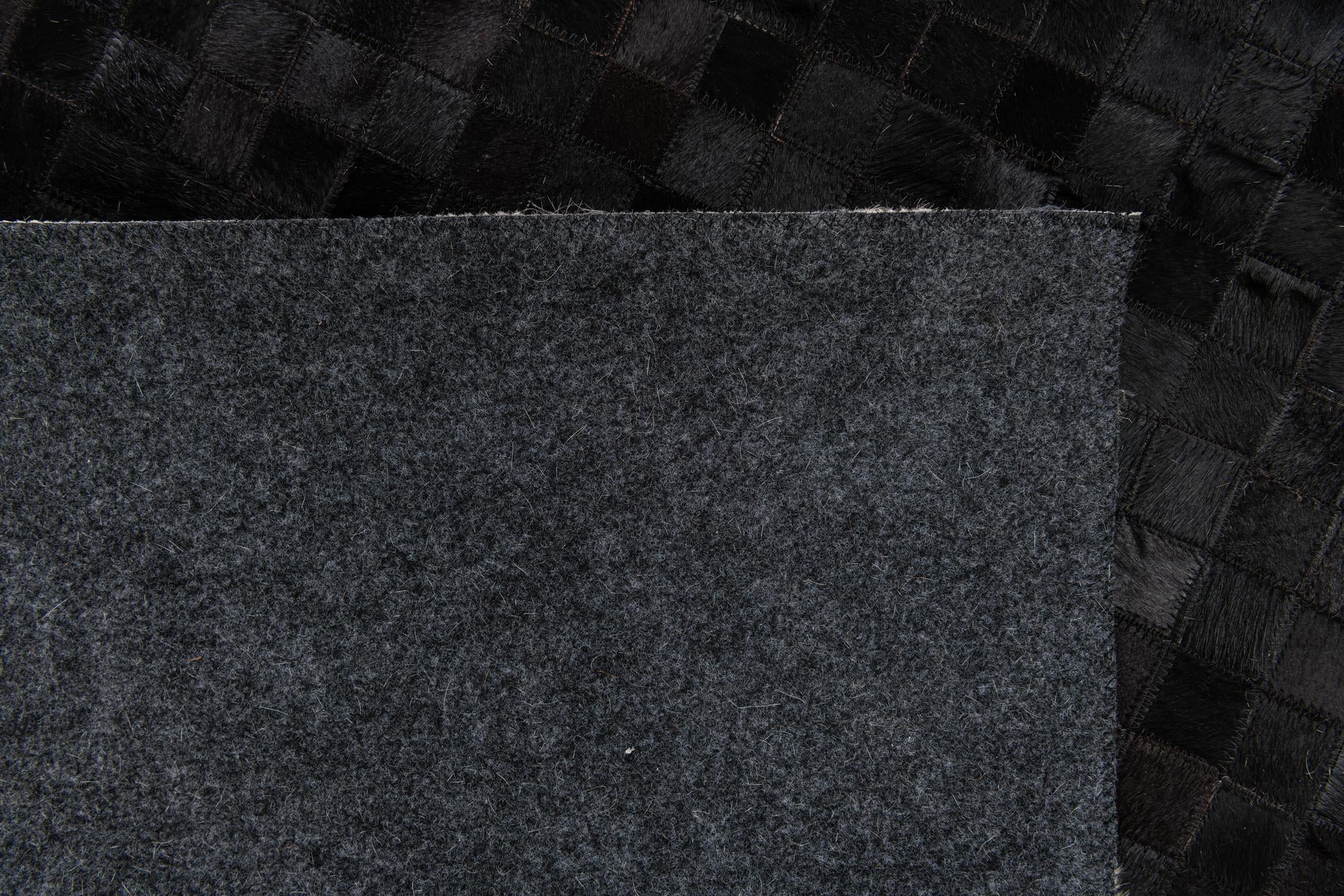5' 2 x 8' 1 Cowhide Stocks Rug