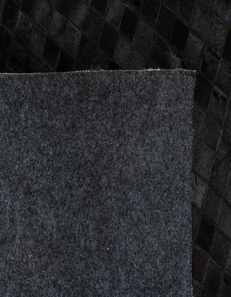 Detail image of 5' 2 x 8' 1 Cowhide Stocks Rug