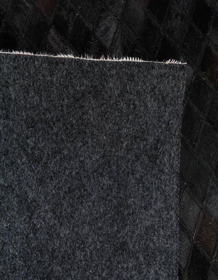 Detail image of 5' 3 x 8' 1 Cowhide Stocks Rug