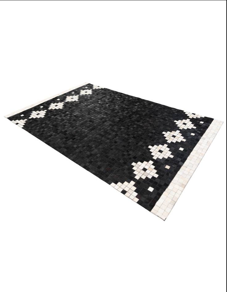 Detail image of 5' 1 x 8' Cowhide Stocks Rug