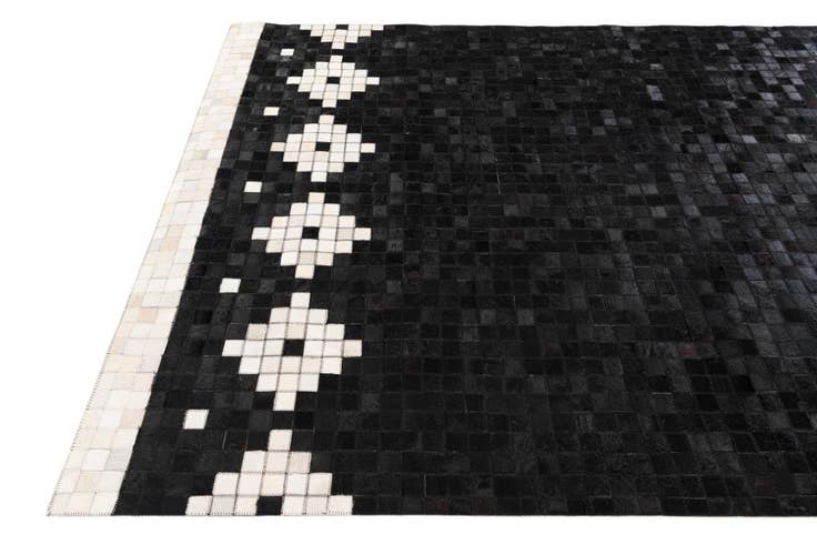 Detail image of 5' 1 x 8' Cowhide Stocks Rug