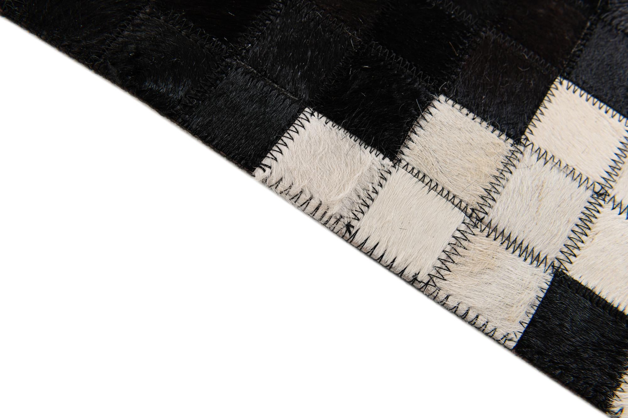 5' 1 x 8' Cowhide Stocks Rug