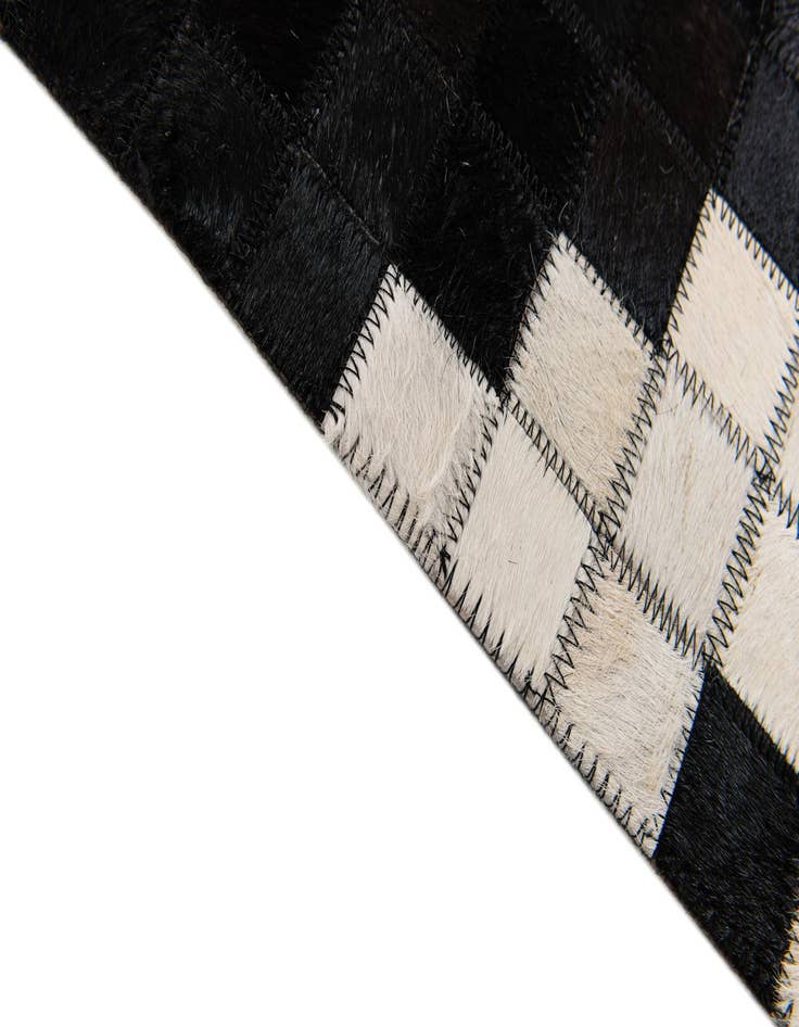 Detail image of 5' 1 x 8' Cowhide Stocks Rug